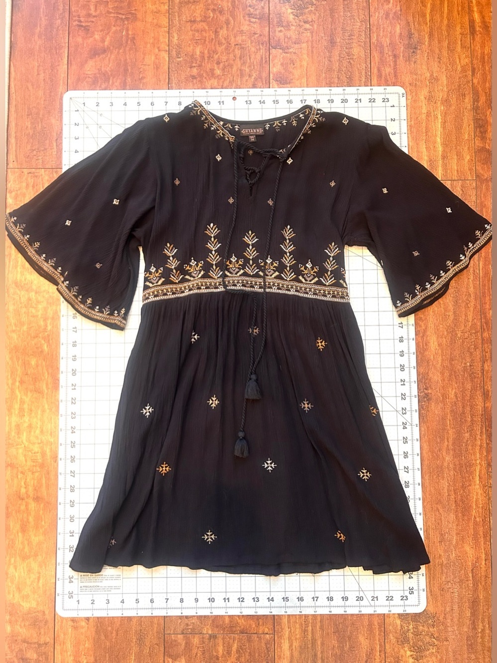 Shyanne Black Boho Bell Sleeve Dress with Gold Embroidery and Tassel Tie | W Med